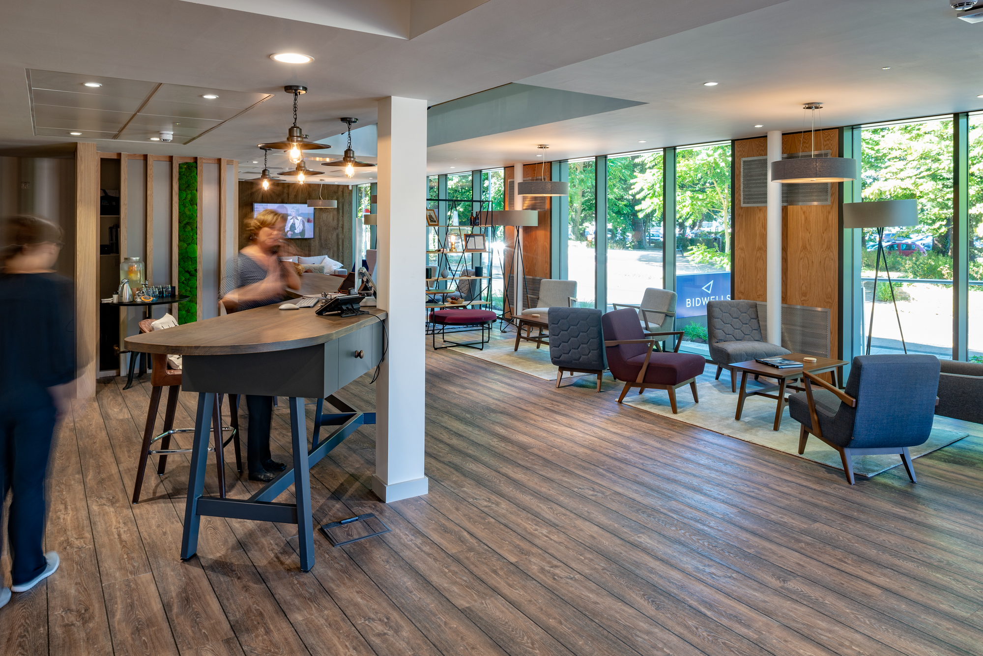 office space with people walking around